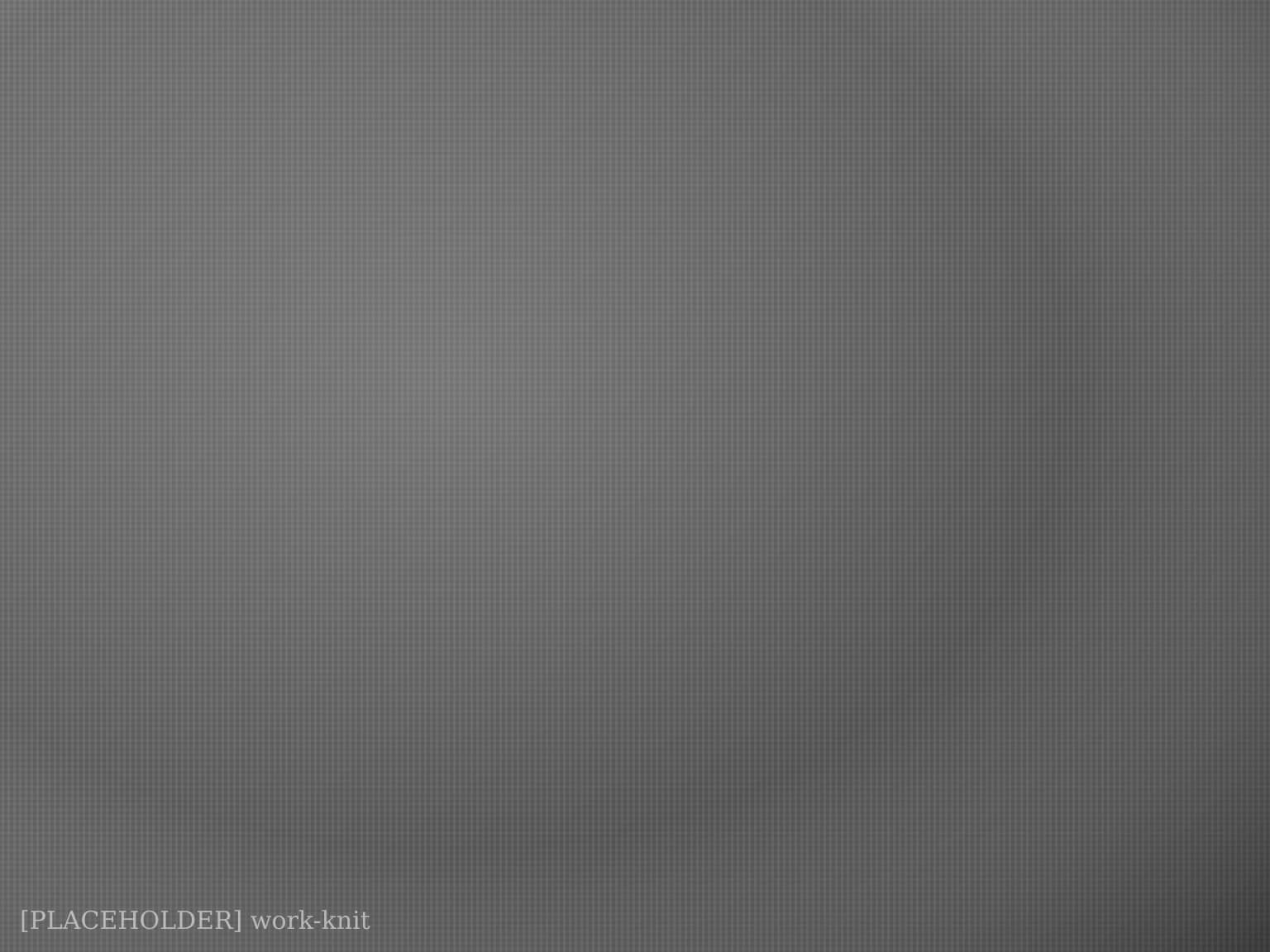 Rolls of soft knit jersey fabric in grey, black and white